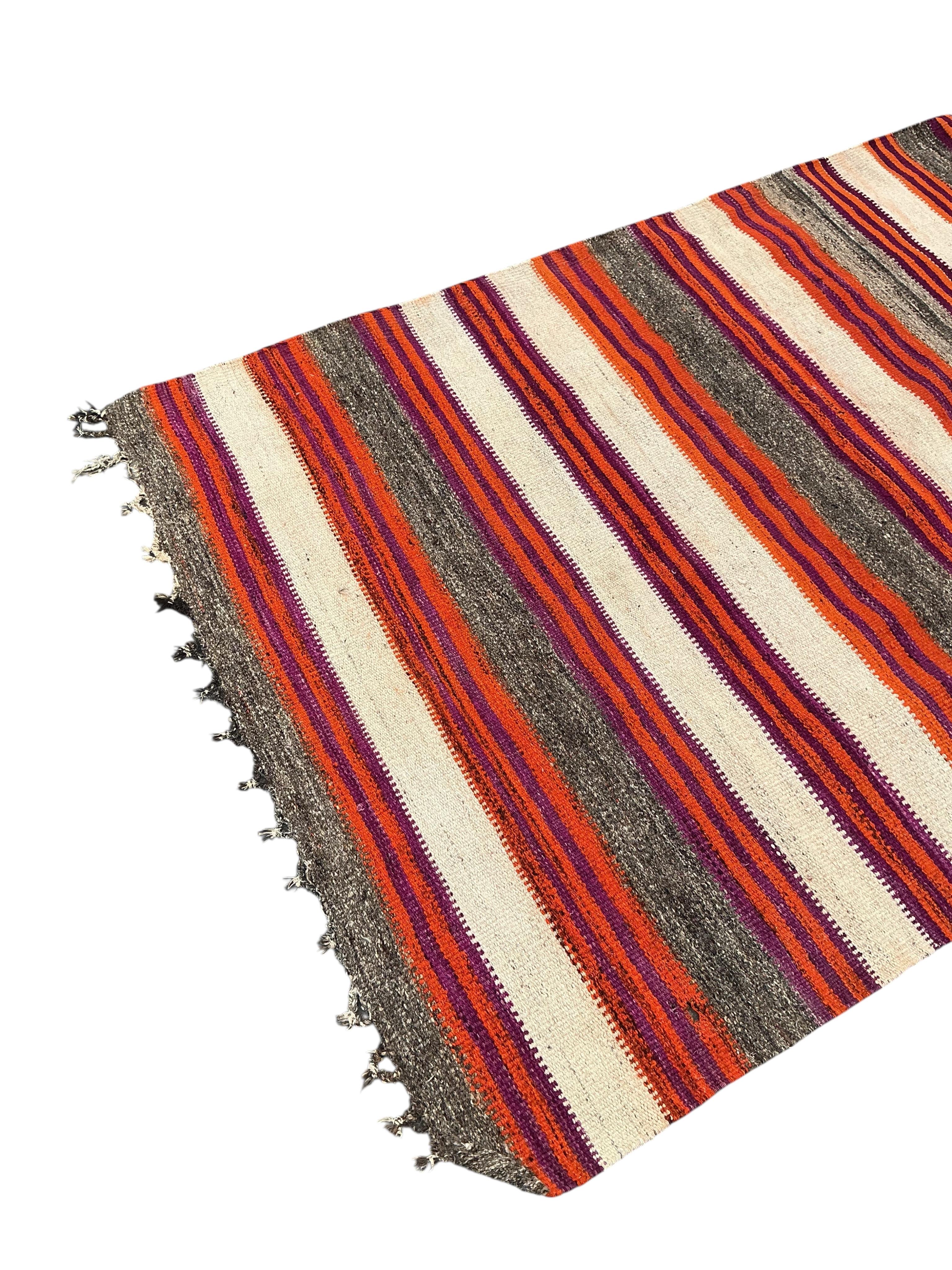 A Turkish kilim carpet, 280 x 140cm